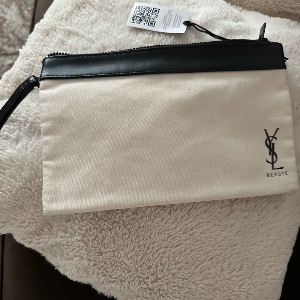 Black and Cream woman YSL beaute  Bag